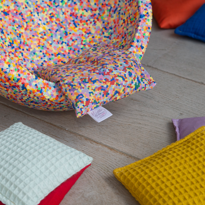 Pastel confetti pittenzakje matcht met stapelstein