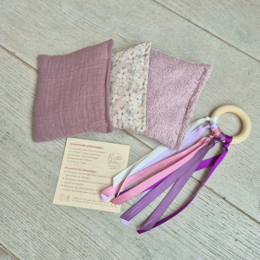 Kraamcadeau met duurzaam speelgoed - Paars