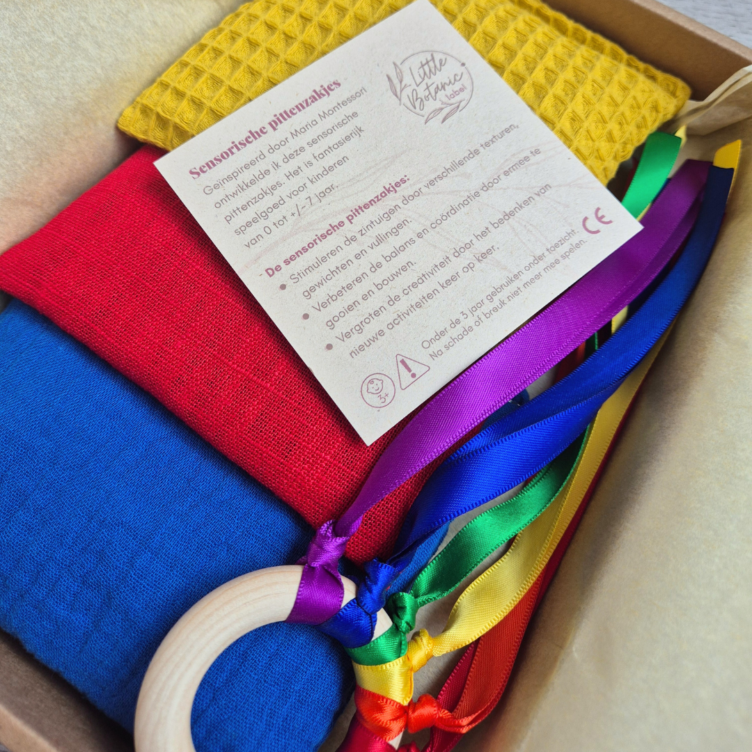 Kraamcadeau met duurzaam speelgoed - Regenboog